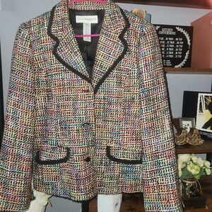 Multicolored blazer with black trimming.